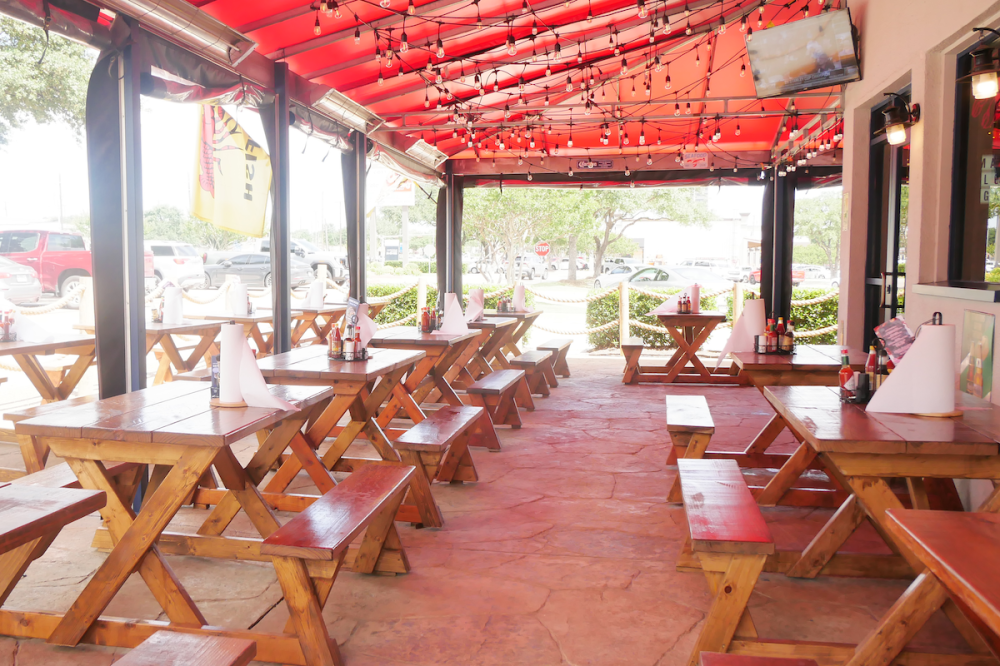 Big Shucks refreshed its outdoor patio space, replacing railings with nautical ropes among other changes. (Courtesy Big Shucks)
