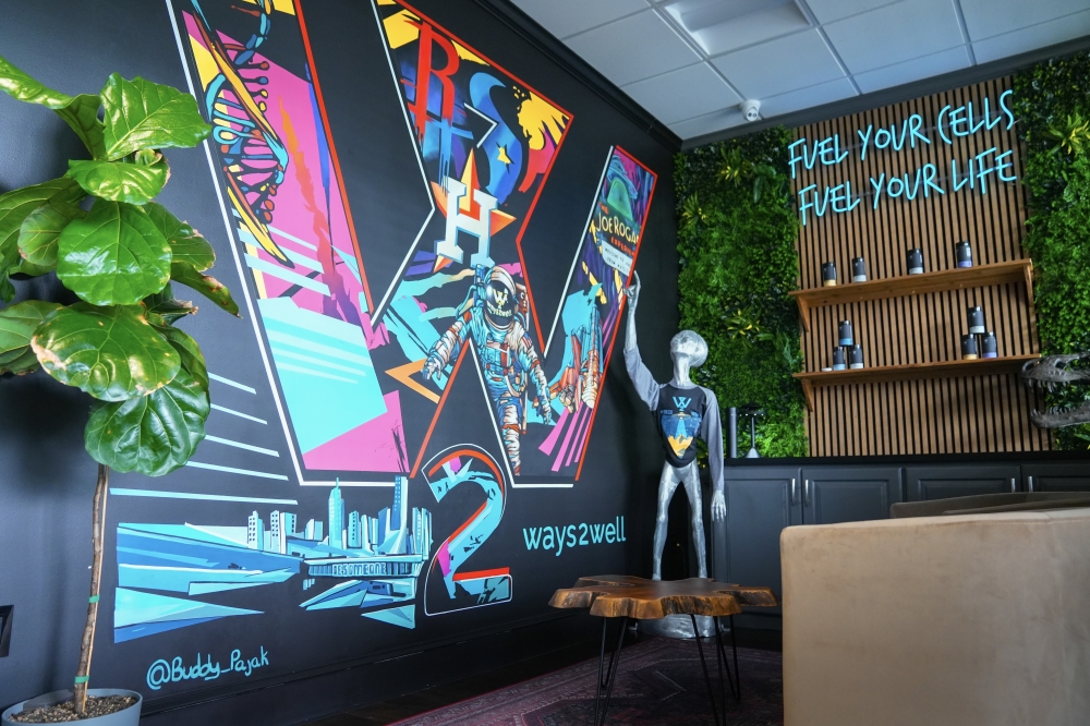 The Ways2Well clinic is designed with futuristic murals depicting elements of space and eternity and is meant to not feel like a traditional doctor's office. (Courtesy Bryson Valencia)