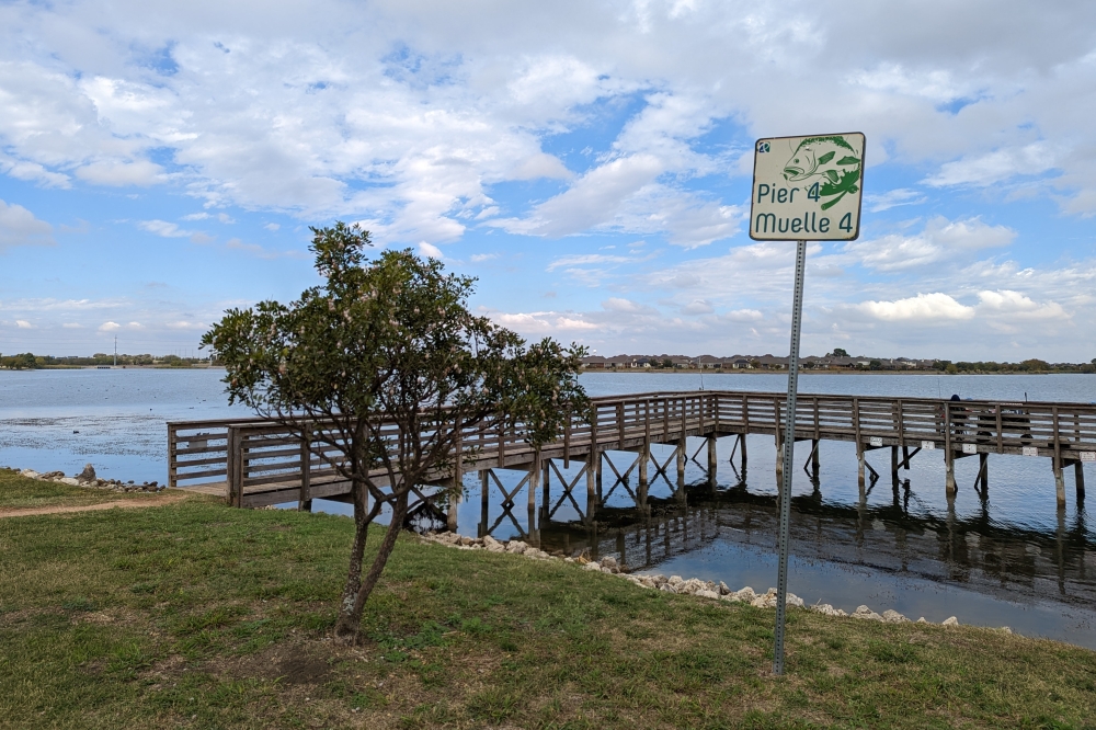 Lake Pflugerville has several fishing piers available to the public along its walking trail. (Community Impact staff)