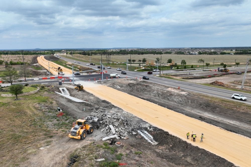 Drone shot of construction on Ronald Regan Boulevard