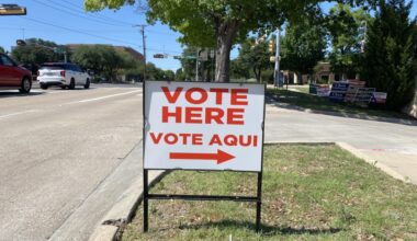 a vote here sign