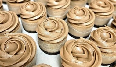 Mini chocoloate cheesecakes lined up on a sheet.