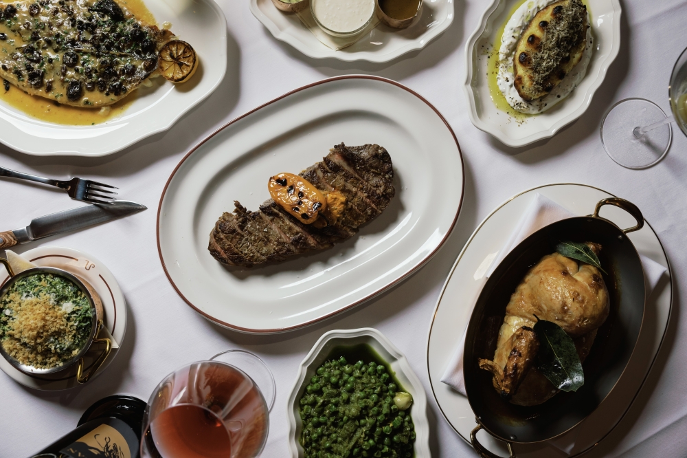 The steakhouse serves up a 16-ounce ribeye ($84) and a 14-ounce New York strip ($76). (Courtesy Justin Cook)