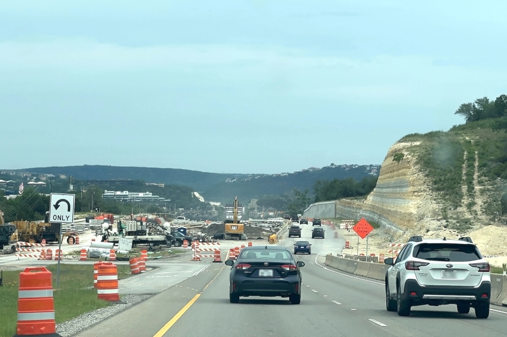 cars driving in construction