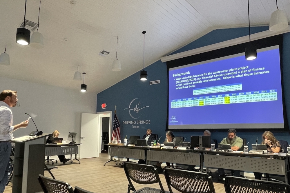 Deputy City Administrator Shawn Cox presented various funding scenarios and background information on wastewater rates at a previous City Council meeting May 5. (Sienna Wight/Community Impact)