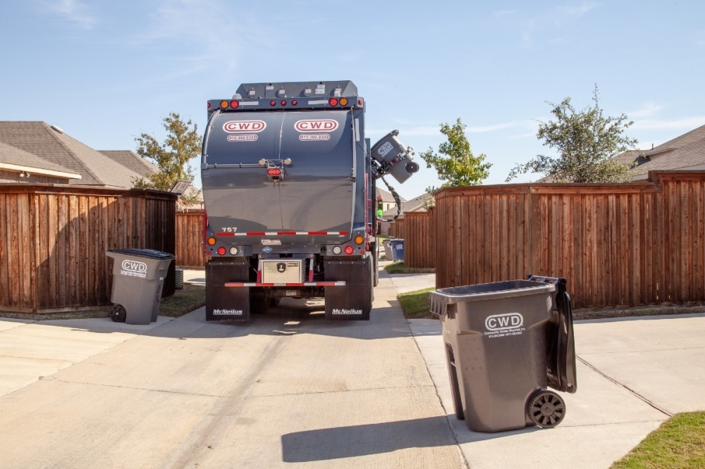 Community Waste Disposal crews in Keller will begin routes as early as 6 a.m. starting June 1 under temporary summer collection hours. (Courtesy CWD)