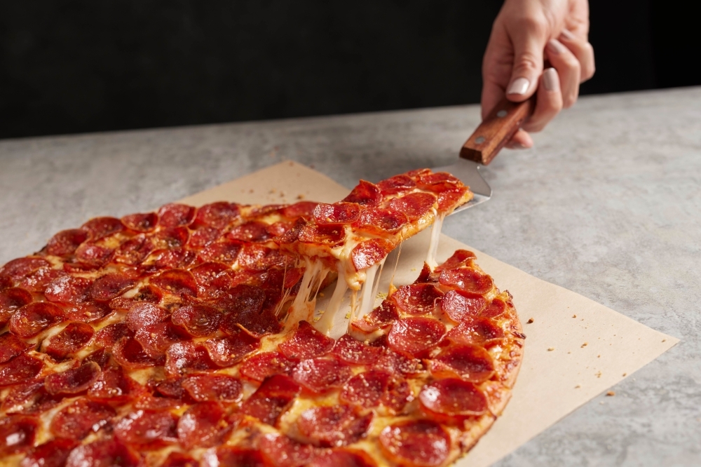 Donatos Pizza offers pizzas with "Edge to Edge" toppings, including crispy family recipe pepperoni. (Courtesy Donatos Pizza)