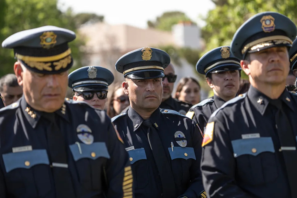 El Paso Police officers listen to remarks by Chief Peter Pacillas during the El Paso Police Memorial in honor of National Police Week at Chuck Heinrich Park, May 15, 2026.