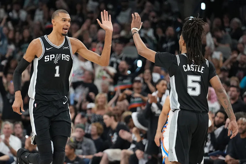 San Antonio Spurs forward Victor Wembanyama (1) reacts with guard Stephon Castle (5) in the second half during Game 6 of the Western Conference Finals for the 2026 NBA playoffs at Frost Bank Center in San Antonio, Texas, on May 28, 2026.