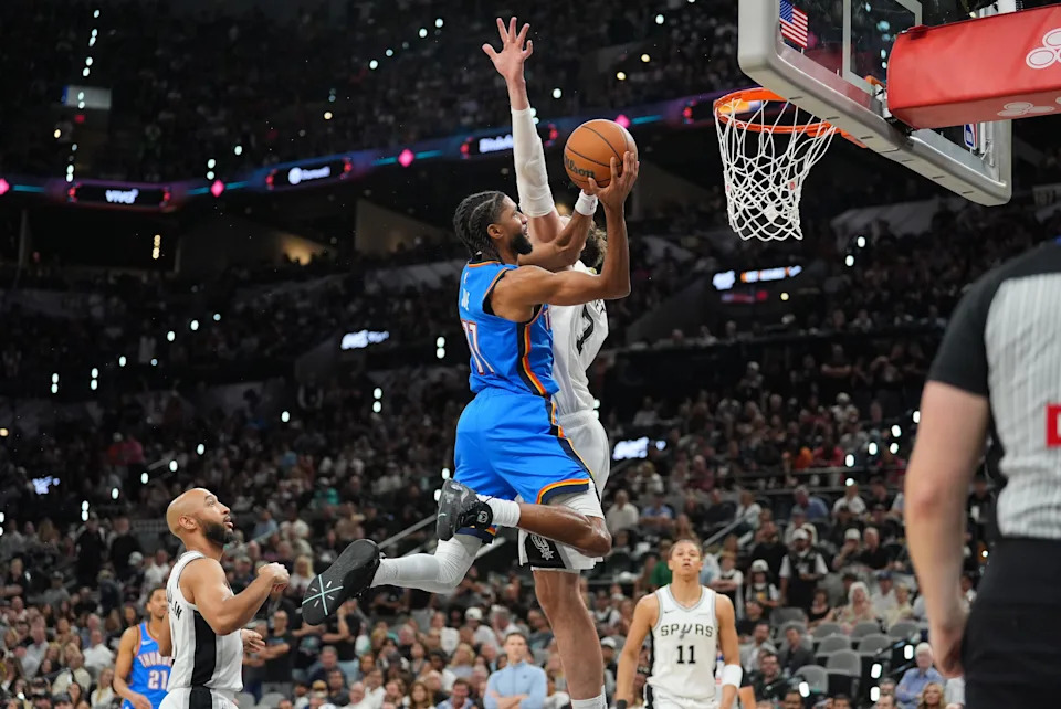 May 24, 2026; San Antonio, Texas, USA; Oklahoma City Thunder guard Isaiah Joe (11) shoots while defended by Oklahoma City Thunder center Chet Holmgren (7) in the fourth quarter during game four of the western conference finals for the 2026 NBA playoffs at Frost Bank Center. Mandatory Credit: Daniel Dunn-Imagn Images