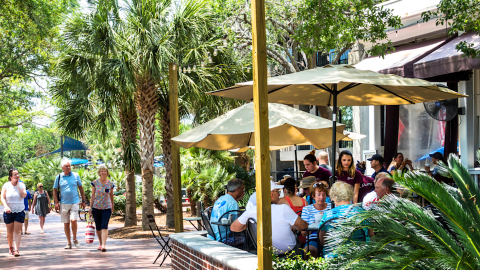 People are seen dining on a patio in Beaufort, South Carolina.