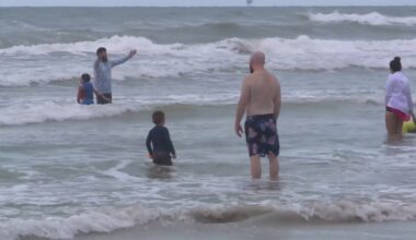 Memorial Day crowds pack Whitecap beach despite rainy weather