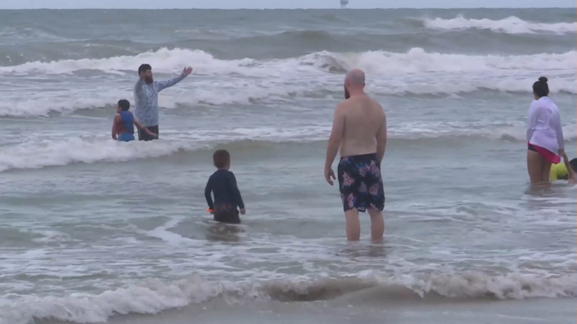 Memorial Day crowds pack Whitecap beach despite rainy weather