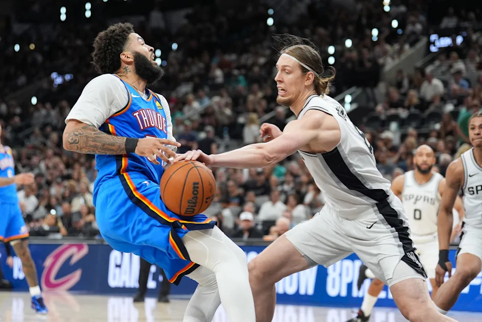 May 24, 2026; San Antonio, Texas, USA; Oklahoma City Thunder forward Kenrich Williams (34) loses the ball to San Antonio Spurs forward Kelly Olynyk (8) in the fourth quarter during game four of the western conference finals for the 2026 NBA playoffs at Frost Bank Center. Mandatory Credit: Daniel Dunn-Imagn Images