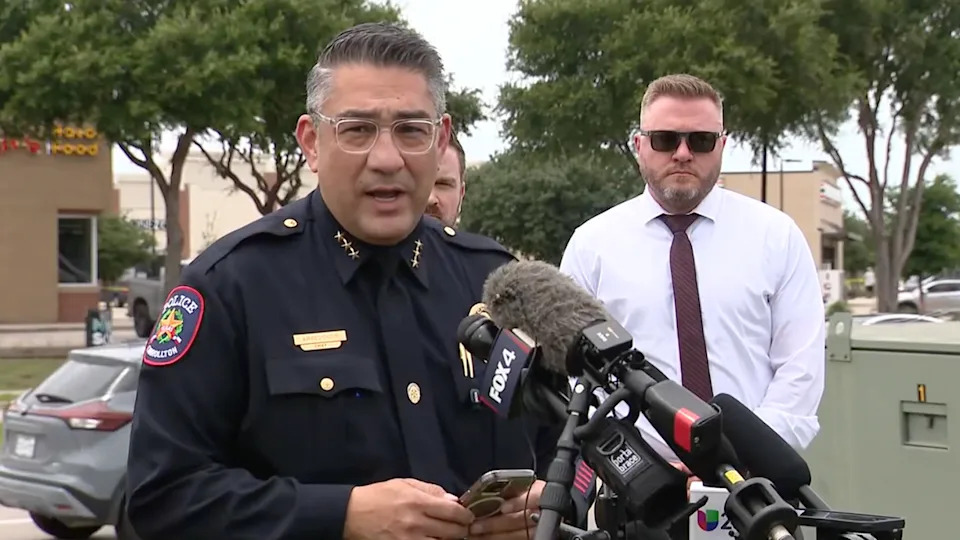 Carrollton Police Chief Roberto Arredondo briefs the press following a shooting in Carrollton, Texas.