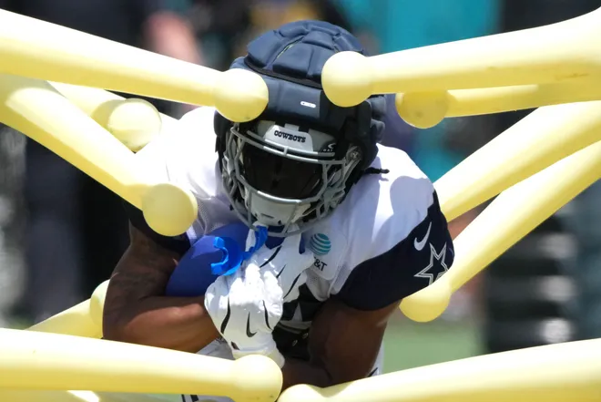Jul 27, 2025; Oxnard, CA, USA; Dallas Cowboys running back Jaydon Blue (34) carries the ball at training camp at the River Ridge Fields. Mandatory Credit: Kirby Lee-Imagn Images
