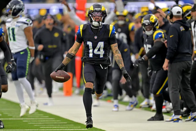 Nov 16, 2025; Inglewood, California, USA; Los Angeles Rams cornerback Cobie Durant (14) celebrates after he was forced out of bounds by Seattle Seahawks wide receiver Jaxon Smith-Njigba (11) after an interception at SoFi Stadium. Mandatory Credit: Jayne Kamin-Oncea-Imagn Images