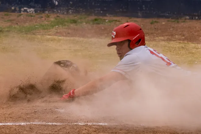 Bel Air’s Julian Lucero (13) slides into home plate to score a run during a baseball game against Chapin on Thursday, April 30, 2026, at Chapin High School in El Paso, Texas.