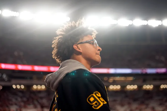 Nov 28, 2025; Austin, Texas, USA; Texas Longhorns quarterback recruit Dia Bell before a game against the Texas A&M Aggies at Darrell K Royal-Texas Memorial Stadium. Mandatory Credit: Scott Wachter-Imagn Images