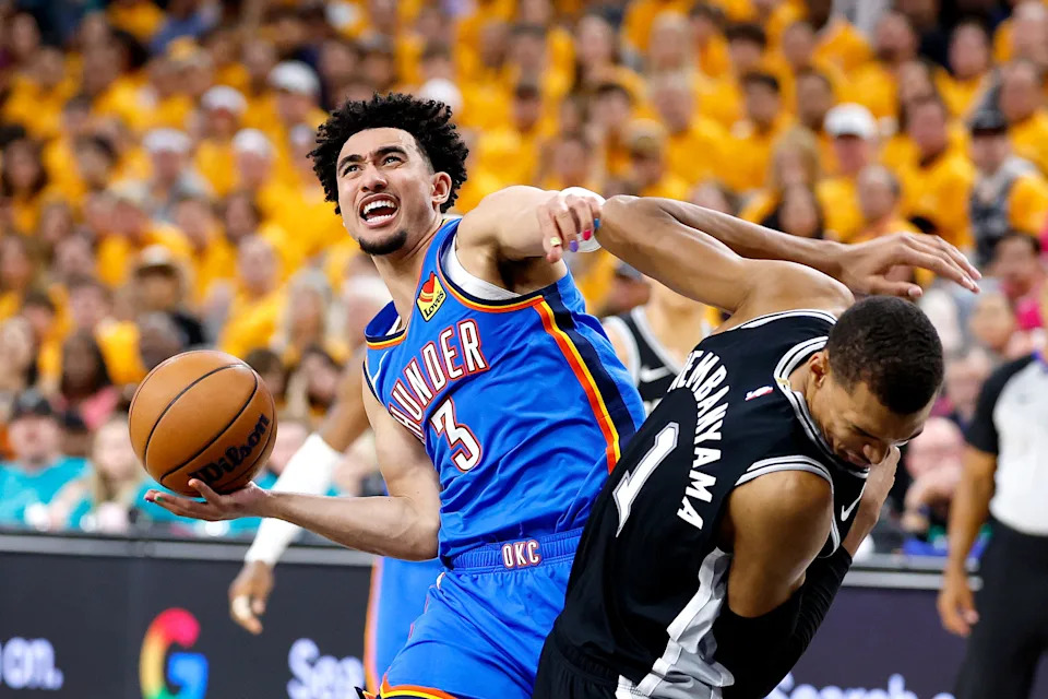 SAN ANTONIO, TEXAS - MAY 22: Jared McCain #3 of the Oklahoma City Thunder looks to shoot the ball against Victor Wembanyama #1 of the San Antonio Spurs during the third quarter in Game Three of the NBA Western Conference Finals at Frost Bank Center on May 22, 2026 in San Antonio, Texas.