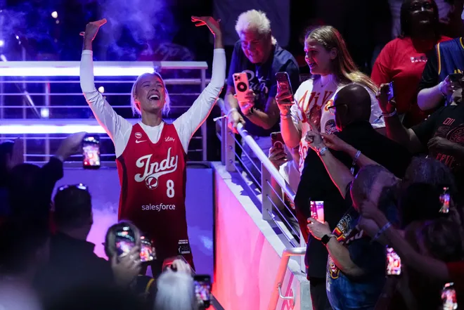 Indiana Fever guard Sophie Cunningham (8) is introduced on Saturday, May 9, 2026, during the first half of the Fever's season opener game at Gainbridge Fieldhouse in Indianapolis.
