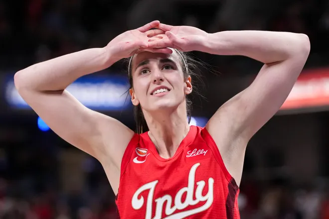 Indiana Fever guard Caitlin Clark (22) reacts on Saturday, May 9, 2026, after losing the Fever's season opener game at Gainbridge Fieldhouse in Indianapolis. The Dallas Wings defeated the Indiana Fever, 107-104.