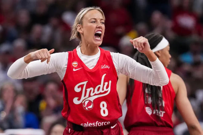 Indiana Fever guard Sophie Cunningham (8) celebrates on Saturday, May 9, 2026, during the second half of the Fever's season opener game at Gainbridge Fieldhouse in Indianapolis. The Dallas Wings defeated the Indiana Fever, 107-104.