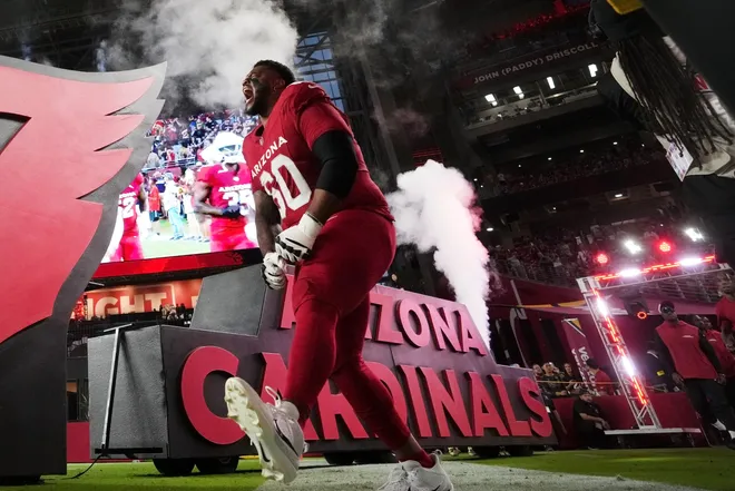 Arizona Cardinals offensive lineman Nick Leverett (60) is introduced before their game against the Las Vegas Raiders at State Farm Stadium in Glendale on Aug 23, 2025.