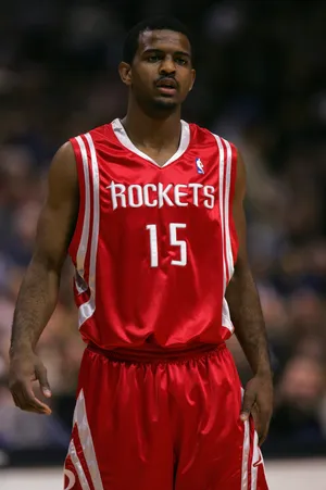 DALLAS - JANUARY 16: John Lucas III #15 of the Houston Rockets looks on during a game against the Dallas Mavericks at American Airlines Center on January 16, 2007 in Dallas, Texas. The Mavs won 109-96. NOTE TO USER: User expressly acknowledges and agrees that, by downloading and/or using this Photograph, user is consenting to the terms and conditions of the Getty Images License Agreement. (Photo by Ronald Martinez/Getty Images)