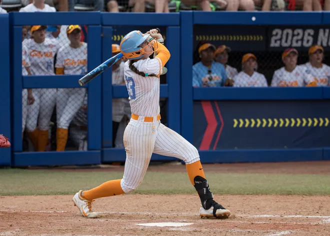 May 30, 2026; Oklahoma City, OK, USA; Tennessee Lady Volunteers infielder Emma Clarke (13) hits a walk-off home run in the ninth inning beating the Texas Tech Red Raiders during the NCAA Women’s College World Series at Devon Park.