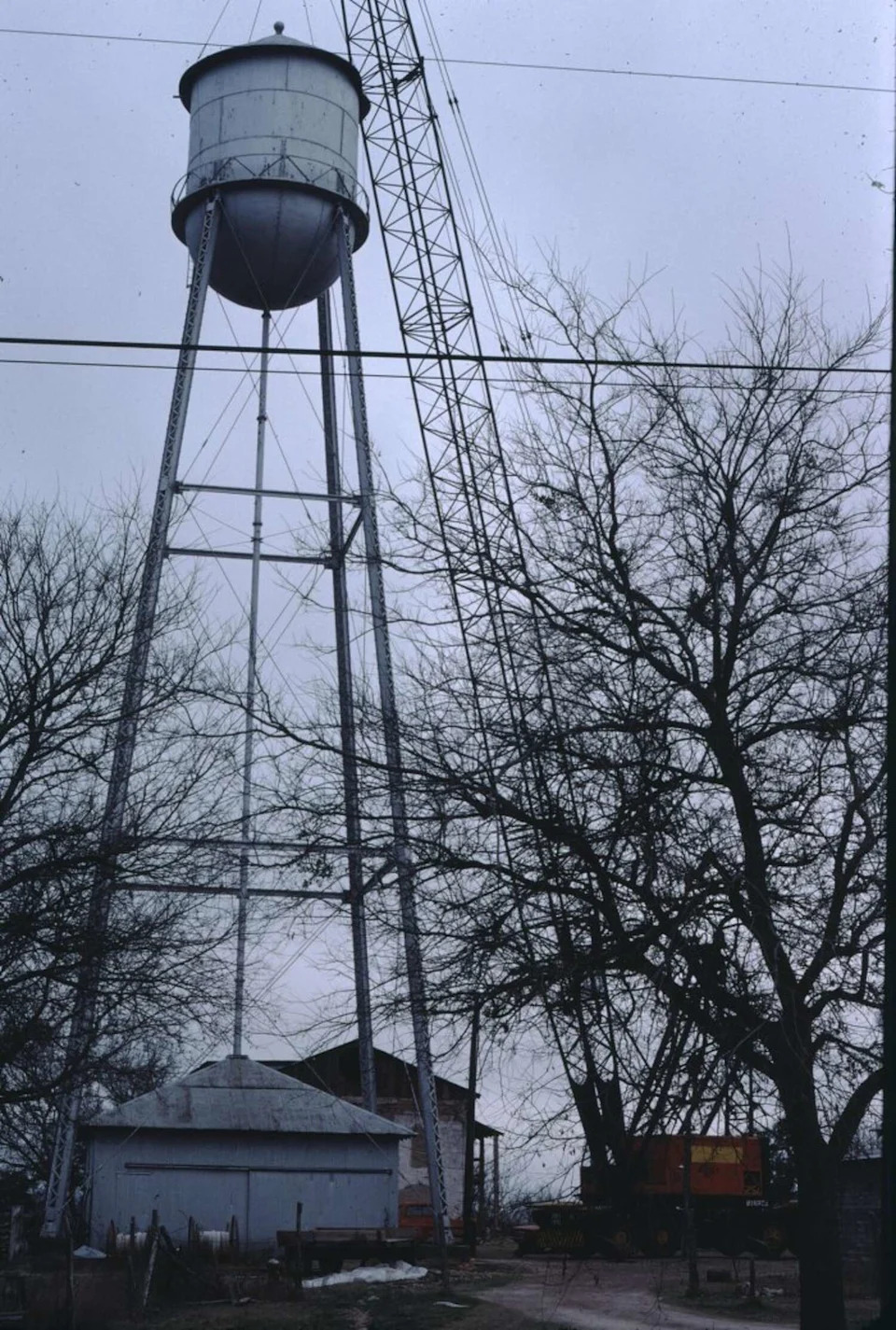 Water tower and crane in Gruene, Texas on February 4, 1976. (Courtesy Of Texas Historical Commission)