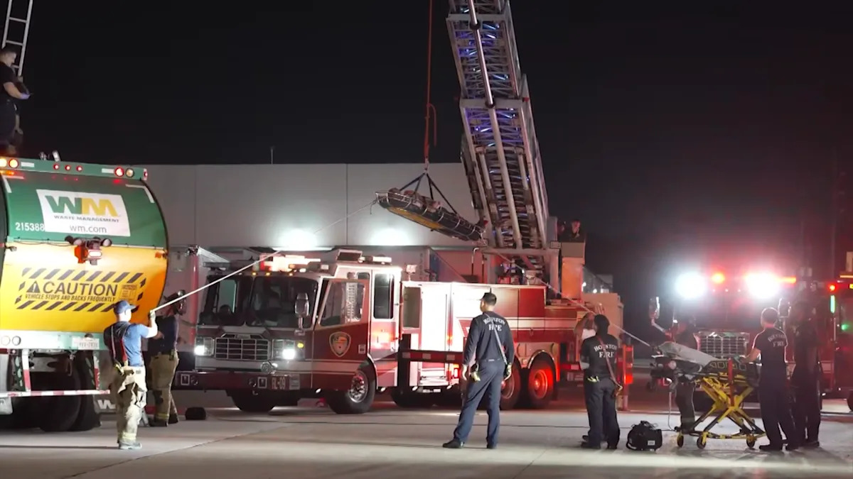 Houston Firefighters Rescued a Man From the Back of a Garbage Truck While He Screamed for Help
