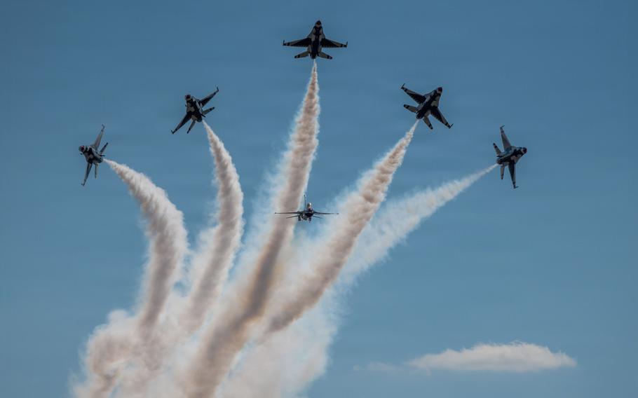 The Thunderbirds perform an aerial demonstration.