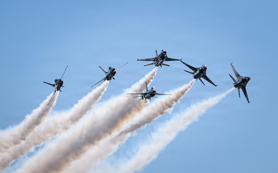 The Thunderbirds perform an aerial demonstration.