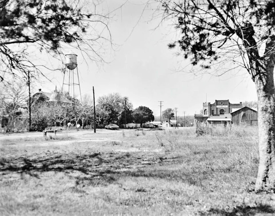 A water tower at the former Hadlock and Fox Manufacturing site stands in Gruene, Texas. The time the photograph was taken is unknown. (Courtesy of Texas Historical Commission)