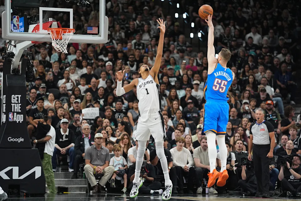 May 24, 2026; San Antonio, Texas, USA; San Antonio Spurs center Victor Wembanyama (1) defends a shot by Oklahoma City Thunder center Isaiah Hartenstein (55) in the first quarter during game four of the western conference finals for the 2026 NBA playoffs at Frost Bank Center. Mandatory Credit: Daniel Dunn-Imagn Images