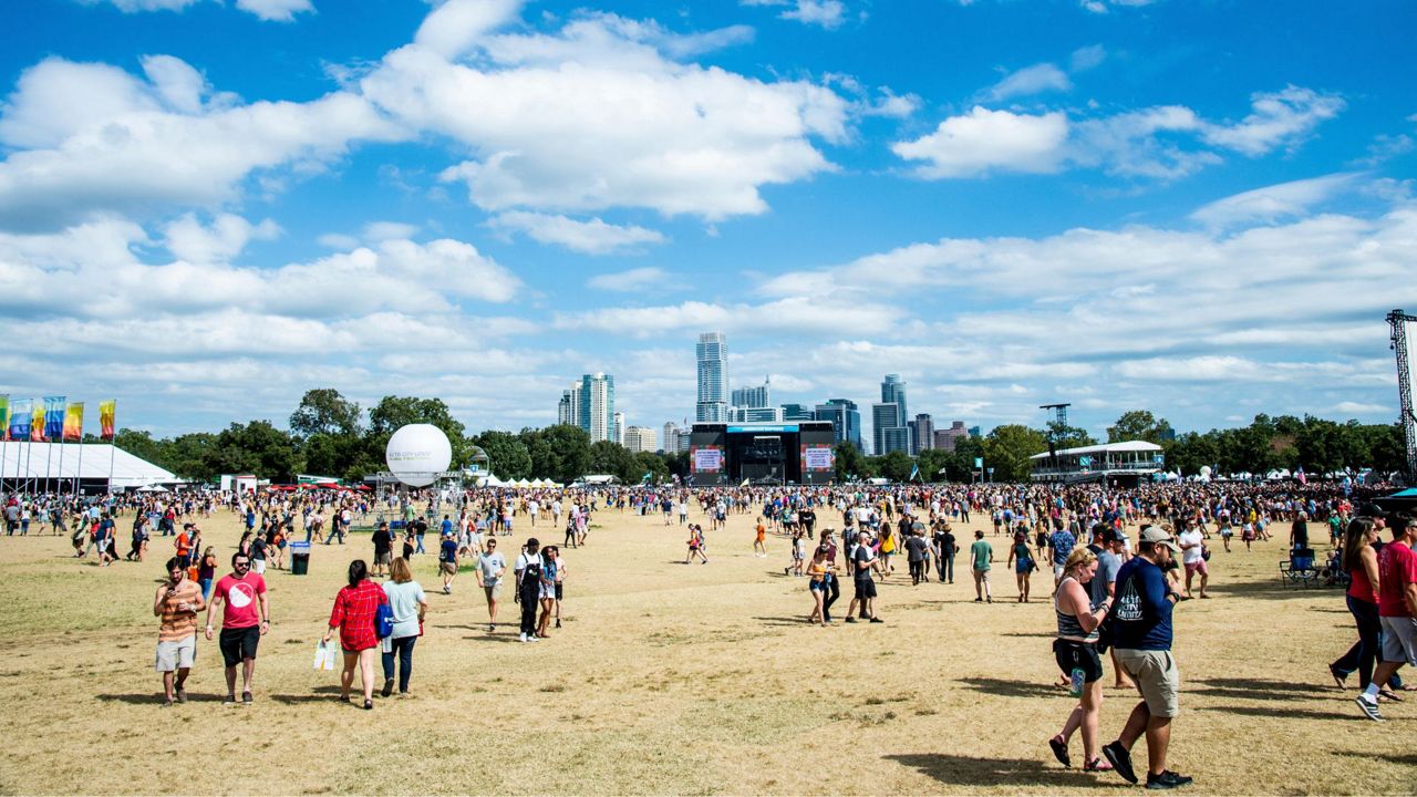 Festival goers seen on day one of the Austin City Limits Music Festival's second weekend on Friday, Oct. 12, 2018, in Austin, Texas. (Photo by Amy Harris/Invision/AP)
