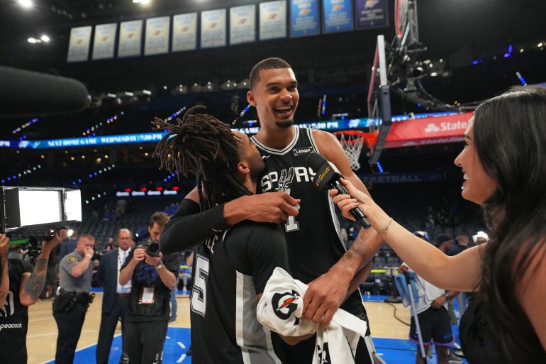 OKLAHOMA CITY, OK - MAY 18: Stephon Castle #5 and Victor Wembanyama #1 of the San Antonio Spurs celebrate after the game against the Oklahoma City Thunder during Game One of the NBA Western Conference Finals on May 18, 2026 at Paycom Center in Oklahoma City, Oklahoma. NOTE TO USER: User expressly acknowledges and agrees that, by downloading and or using this photograph, User is consenting to the terms and conditions of the Getty Images License Agreement. Mandatory Copyright Notice: Copyright 2026 NBAE Jesse D. Garrabrant/NBAE via Getty Images/AFP (Photo by Jesse D. Garrabrant / NBAE / Getty Images / Getty Images via AFP)