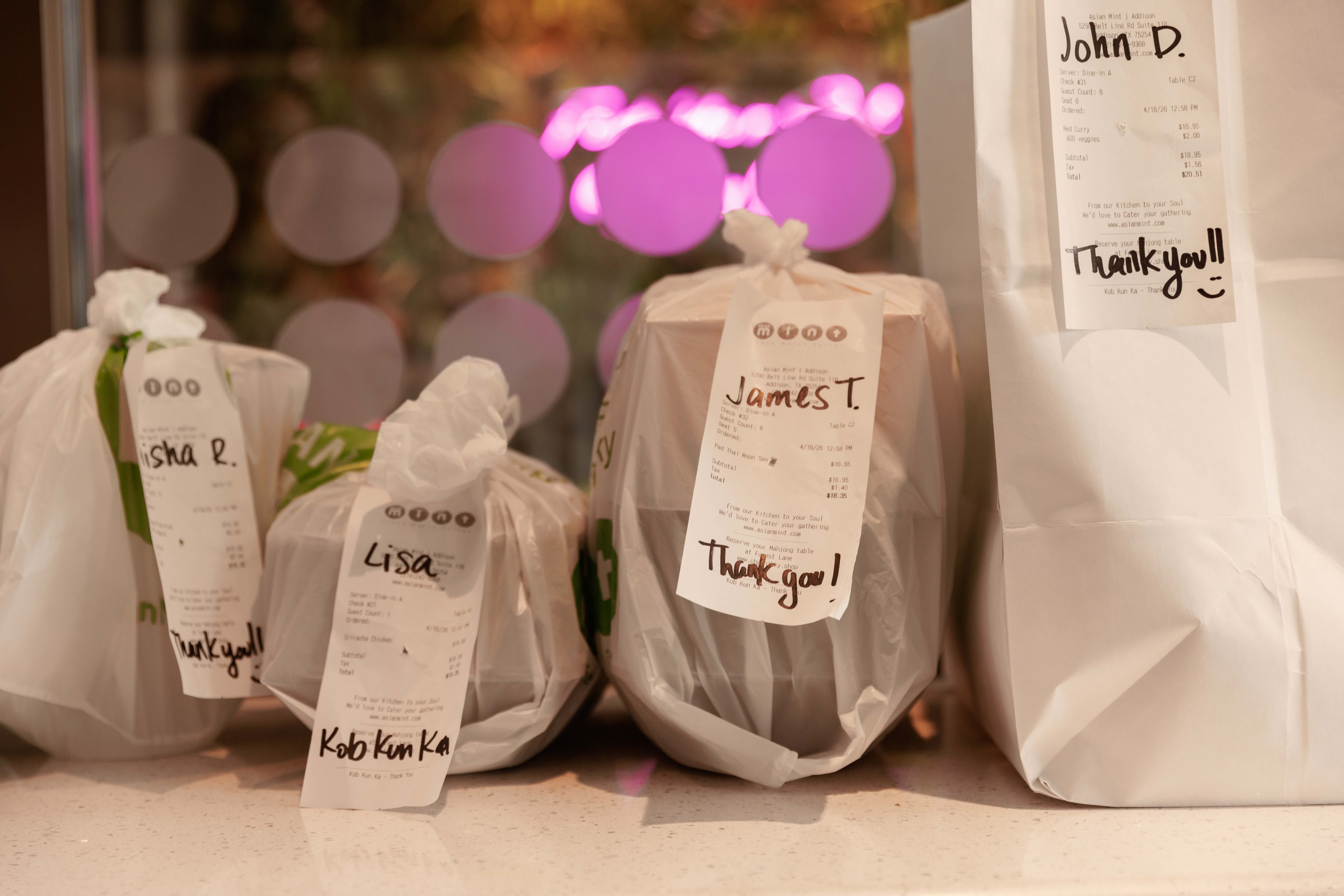 take out bags at a Thai restaurant