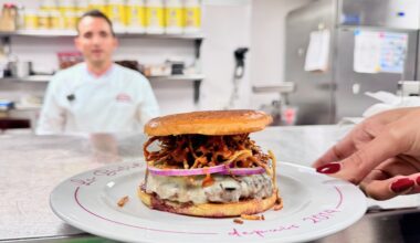 chef Eliott Azoulay at Bar Sardine cooking a burger