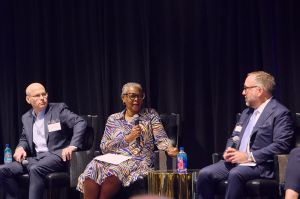 Ted Norman (left), Tamela Thornton (center) and Andy Carmody speak at the Commercial Observer Dallas Development and Investment Forum.