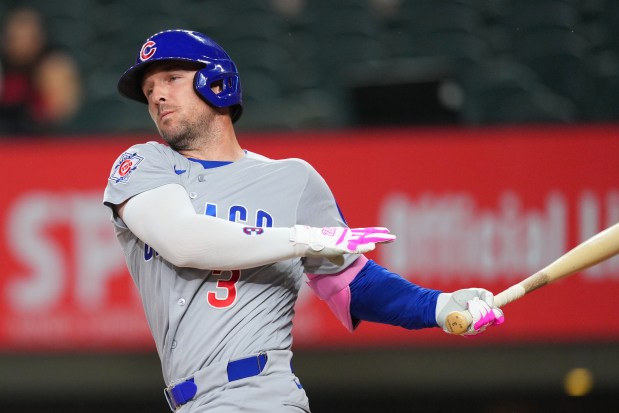 The Cubs' Alex Bregman swings and misses a pitch from Rangers starter Kumar Rocker during the first inning Friday, May 8, 2026, in Arlington, Texas. (AP Photo/Julio Cortez)