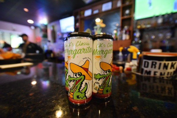 A pack of CK's anned margarita on the patio of CK's Classic Margarita sits on the bar in Cantina & Grill in Dallas Thursday, May 21, 2026. (SEAN MCKEAG / STAFF PHOTOGRAPHER)
