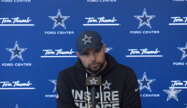 Dallas Cowboys OC Klayton Adams talking to reporters.
