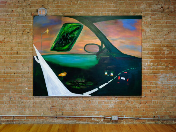 A photograph of a painting of the interior of a car, with the ocean visible through the window.