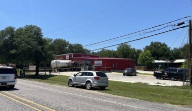 One dead after collision that sent large service truck into food mart near Belton, Texas