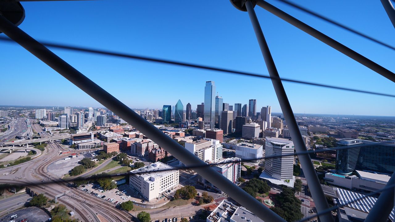 The Dallas skyline is visible through the framing of Reunion Tower, Nov. 6, 2025, in Dallas. (AP Photo/Julio Cortez, File)