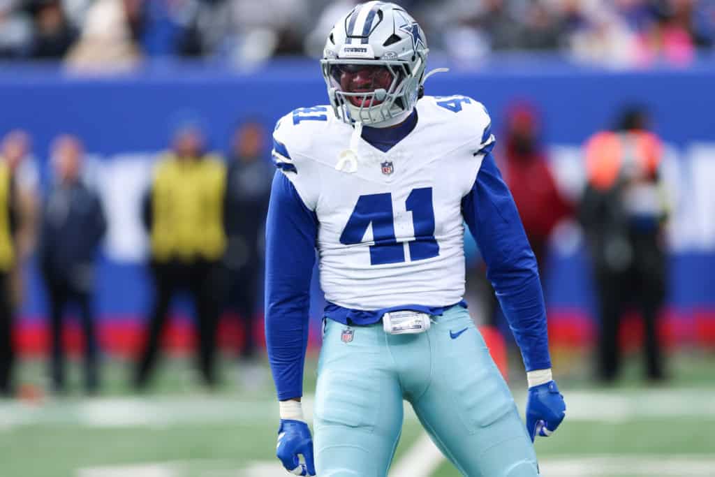 Cowboys Defense Projection: How Much Better Can Dallas Be in 2026 Dallas Cowboys defender Donovan Ezeiruaku stands on the field in uniform as part of the Cowboys defense.