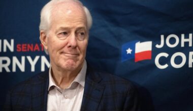 Sen. John Cornyn, R-Texas, listens to State Sen. Charles Perry, R-Lubbock, during a campaign event ...