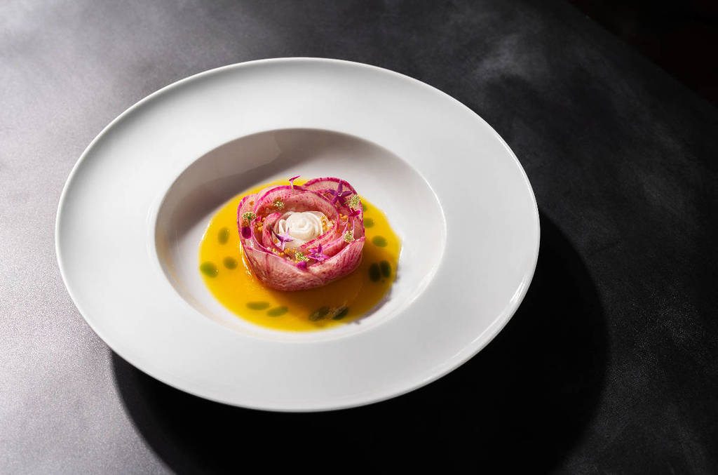 Image shows an elegantly plated dish.